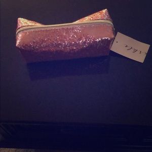 Cute, small pink glittered bag